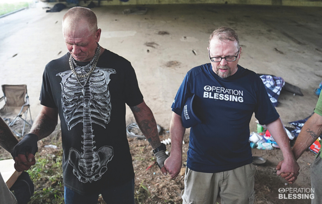 praying with storm victims