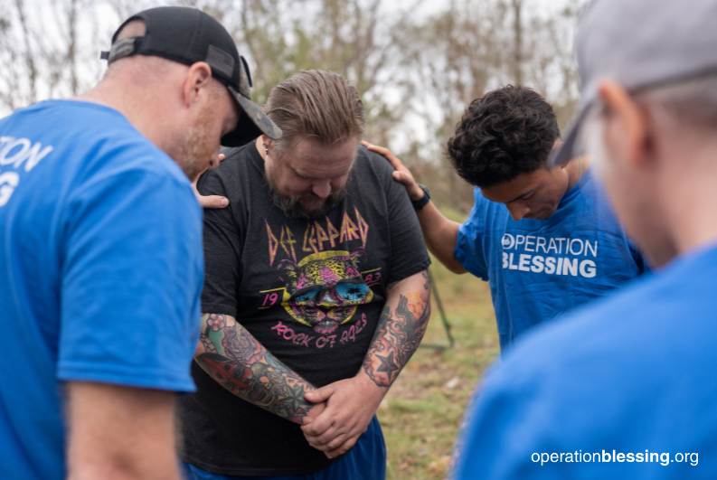 praying with Josh Ellwood in Valdosta Georgia