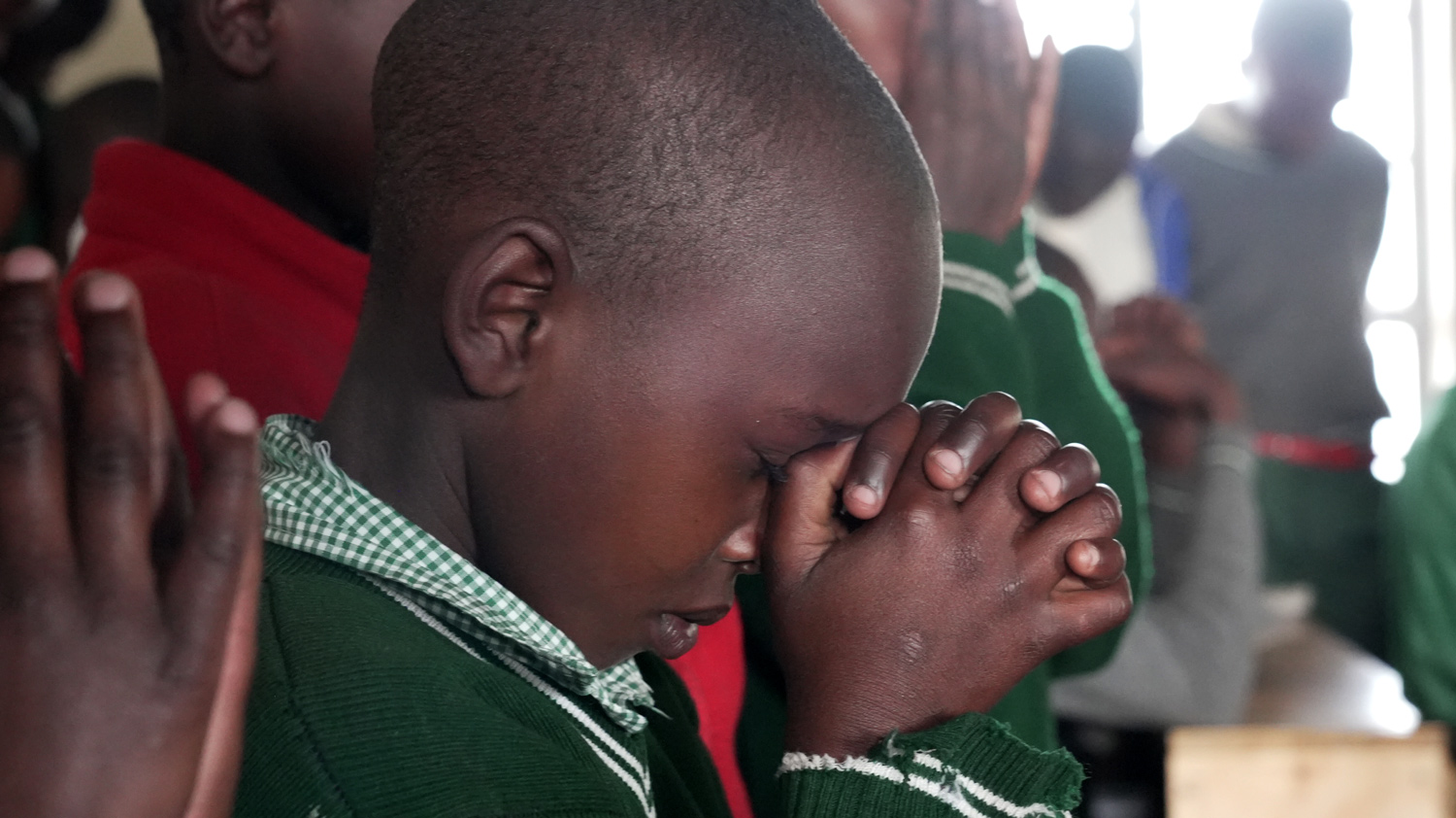 Awaken Devotional praying child