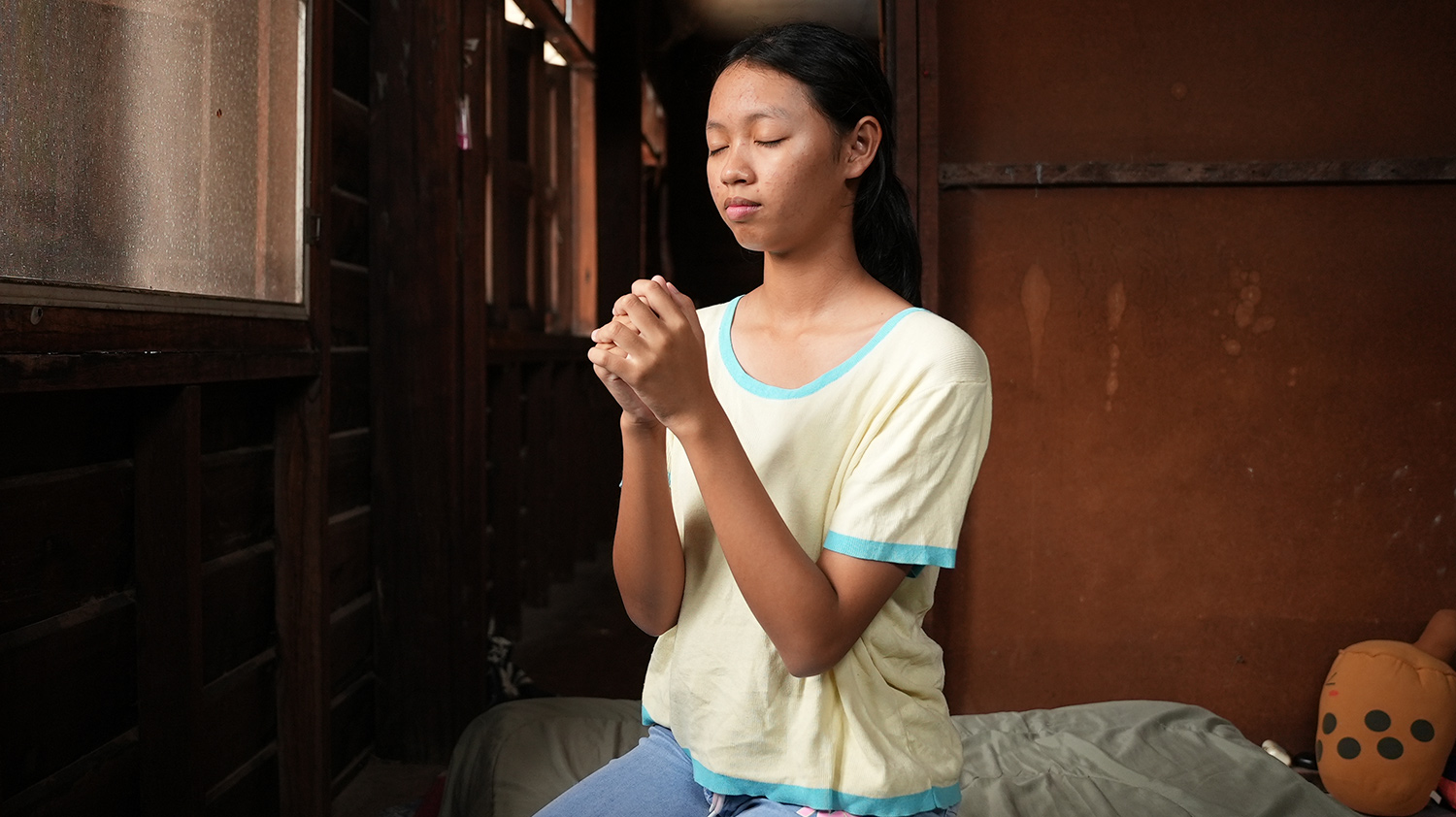 Awaken Devotional praying child