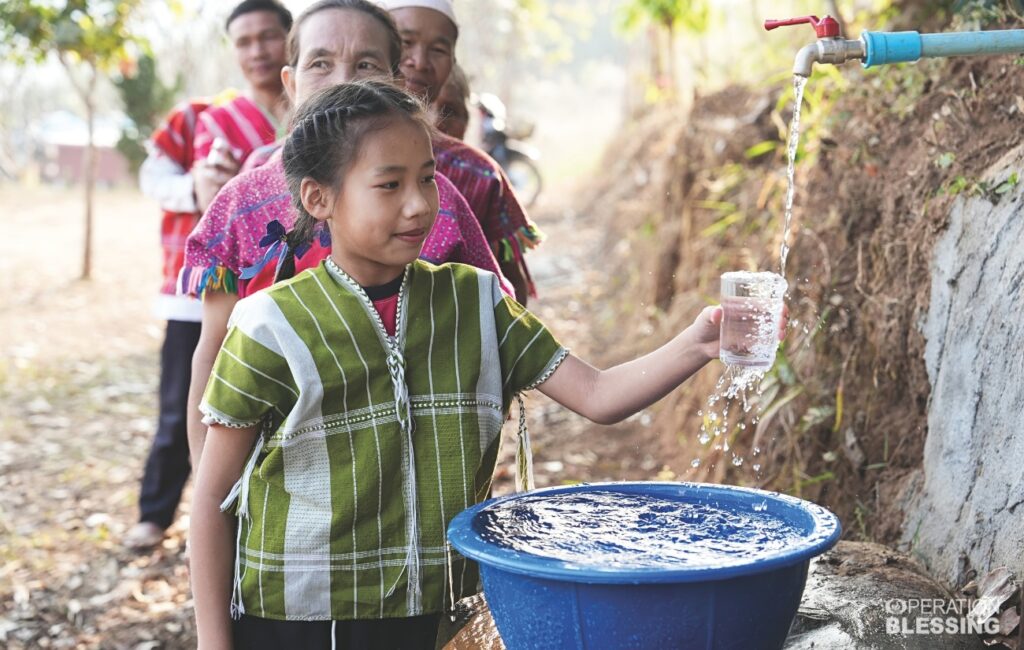 children drinking clean water