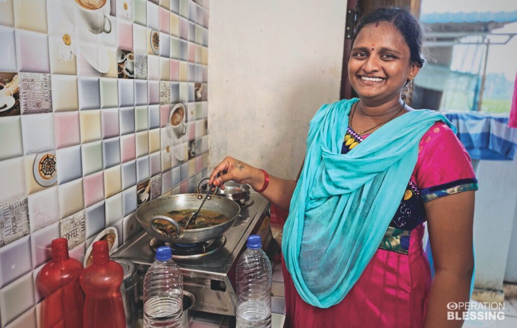 clean drinking water for a mother in India